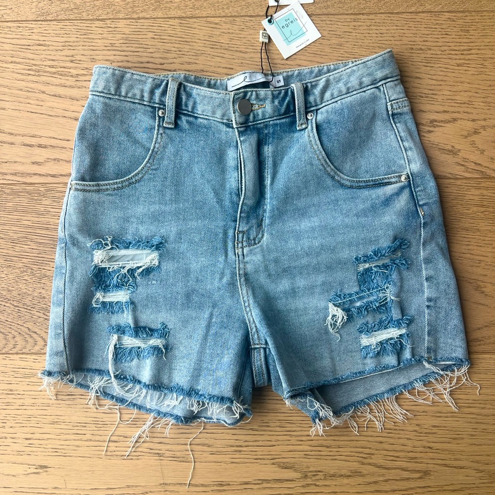 By Egreis Small denim shorts with covered rips